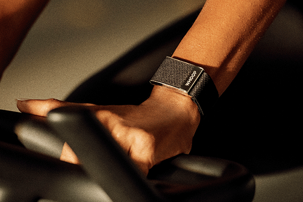 Whoop Band on wrist during an intense workout – premium fitness tracking accessory for WHOOP 4.0, designed for comfort and performance. Available at Strapco