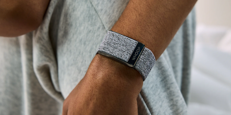 Whoop SuperKnit Band on wrist – premium original strap for WHOOP® 4.0, featuring durable steel frame and soft fabric design. Available at Strapcostore