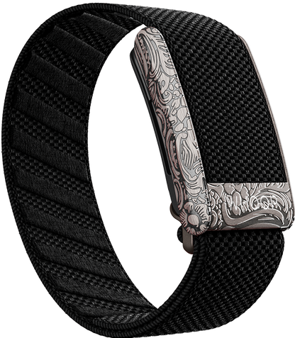 "Introducing Obsidian, the latest addition to the Etched Metal SuperKnit Band collection. Discover the intricate details of unique engraved metal hardware paired with ultra-comfortable SuperKnit material, exclusively available at Strapco Store. Compatible with WHOOP® 4.0. #Strapco #Whoop #ObsidianBand #EtchedCollection"